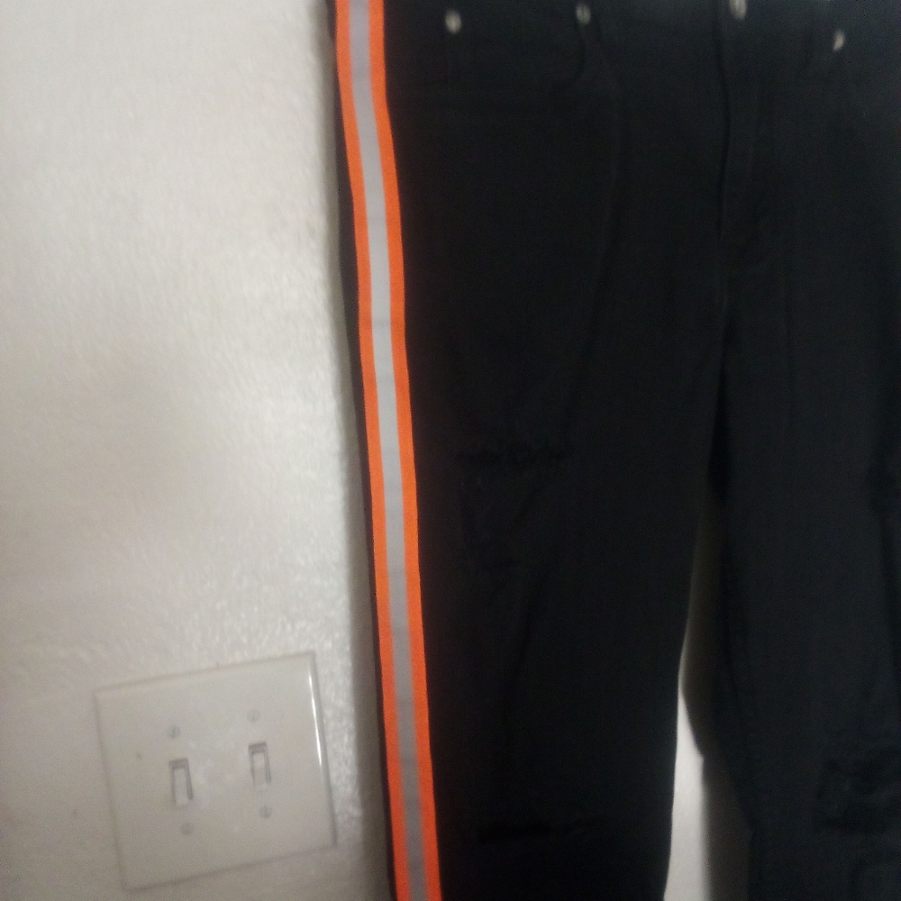 Distressed black denim w/premade holes orange and gray stripe on legs 34W Skinny